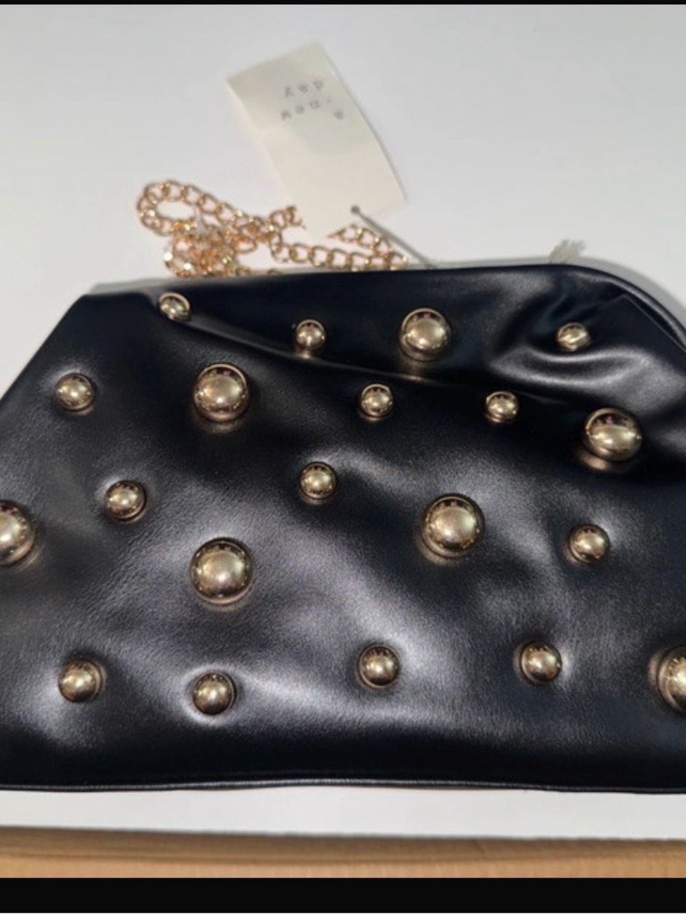 Black Stud-Embellished Wristlet Clutch with Gold Chain